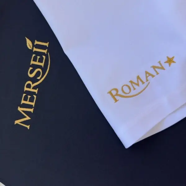 Têxtil bordado a dourado para restaurante